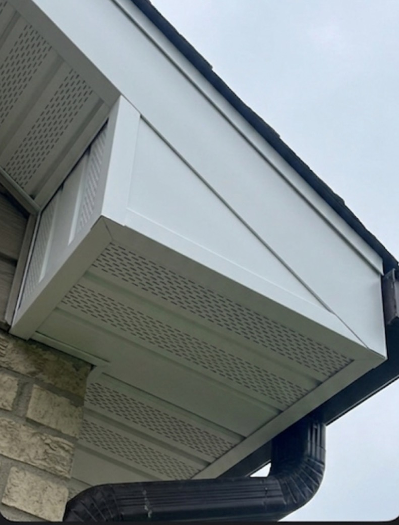 New seamless gutters, downspout, soffit and fascia installed by GRA